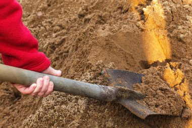 İnşaat Küreği kum sıkışmış. çalışmaları sırasında break