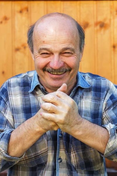 Elderly man rather claps. — Stock Photo, Image