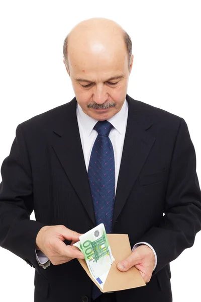 Anciano esconde dinero en un bolso — Foto de Stock