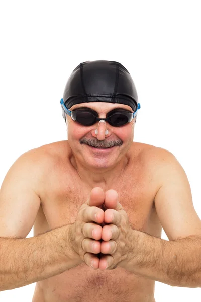 Elderly man preparing to dive into pool — Stock Photo, Image