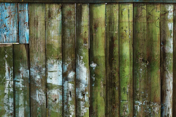 Старый потрепанный деревянный забор фон — стоковое фото