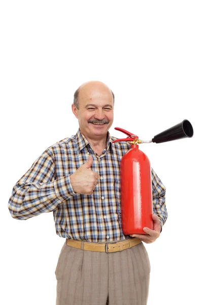 Älterer Mann hält einen roten Feuerlöscher in der Hand. — Stockfoto