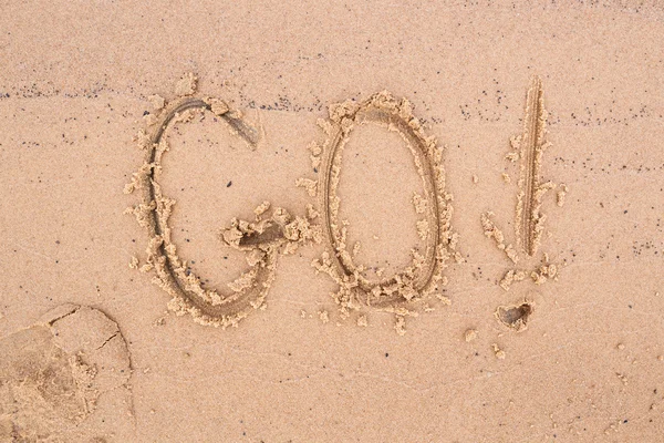 Nápisy na písku: go! — Stock fotografie