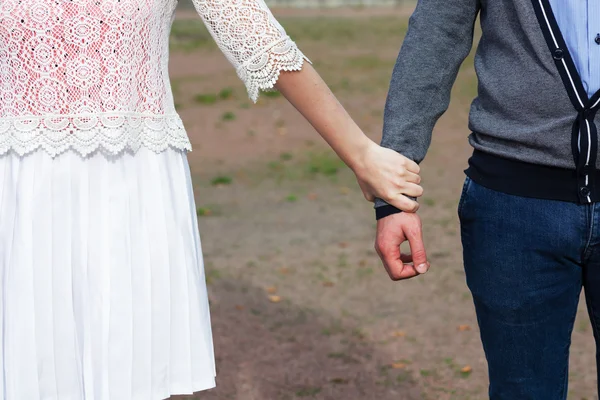 Follow me. Girl pulls boy's hand — Stock Photo, Image