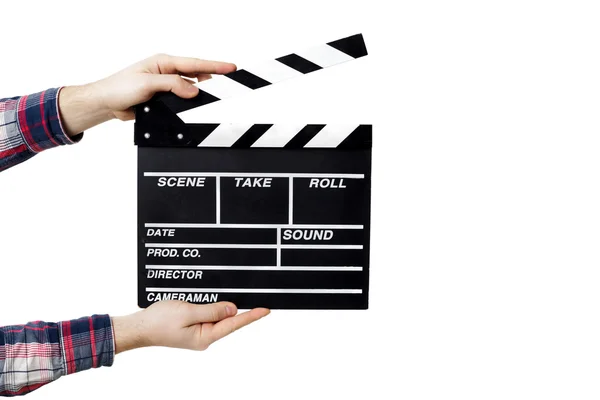 Man holding an opened clapperboard — Stock Photo, Image