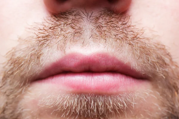 Man with a three-day unkempt unshaven stubble in white shirt — Stock Photo, Image