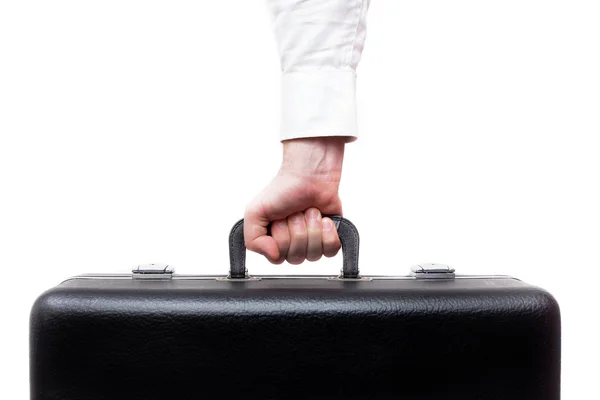 Мужчина несет тяжелый чемодан — стоковое фото