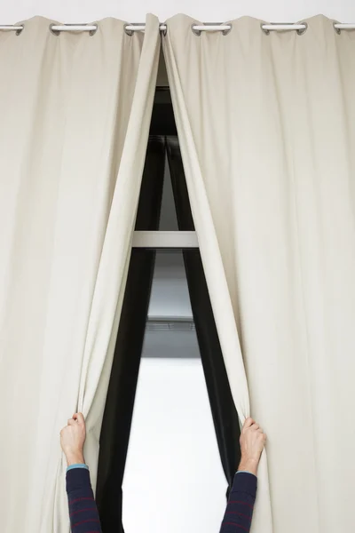 Curtains on the window. Hand pushing the curtain — Stock Photo, Image