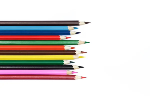 Sharp sharpened colored pencils on a white background - statione Stock Photo