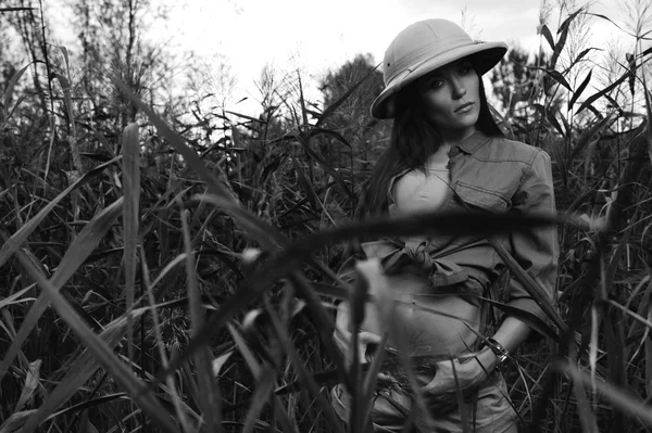 Safari woman in swamp black and white — Stock Photo, Image