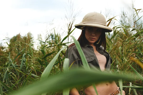 Safari woman in swamp — Stock Photo, Image