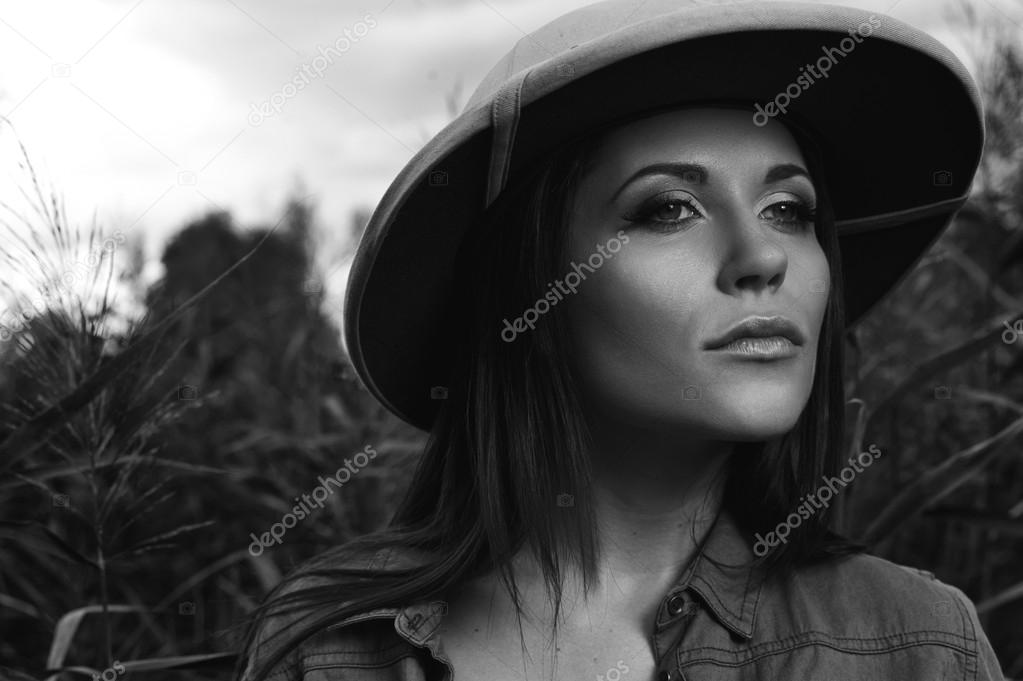 safari woman in swamp black and white
