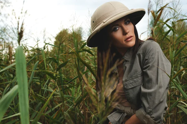 Safari woman in swamp — Stock Photo, Image