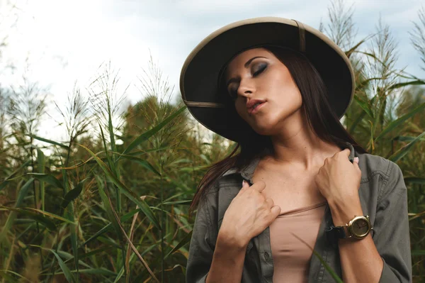 Safari woman in swamp — Stock Photo, Image