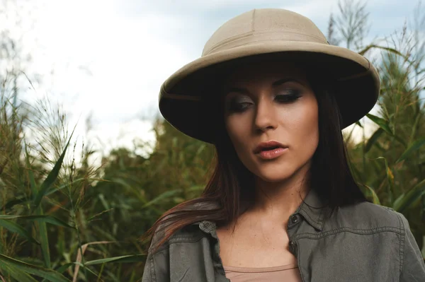 Safari woman in swamp — Stock Photo, Image