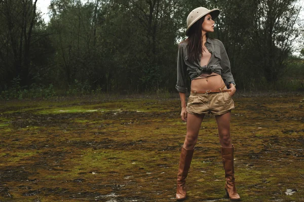 Safari woman in  the morning swamp — Stock Photo, Image