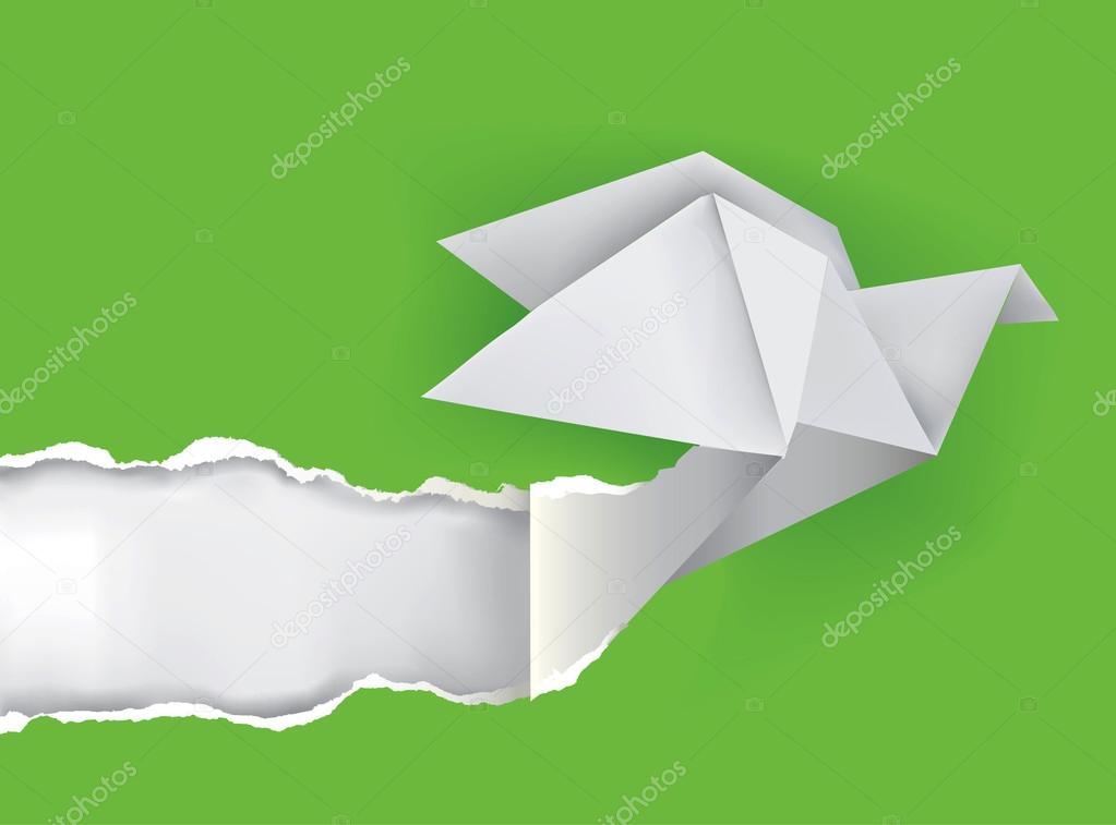 Origami bird ripping green paper.