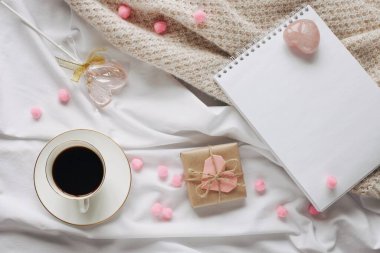 Flat lay Happy Valentine's Day photography with gift box and paper origami hearts. Romantic greeting card. 