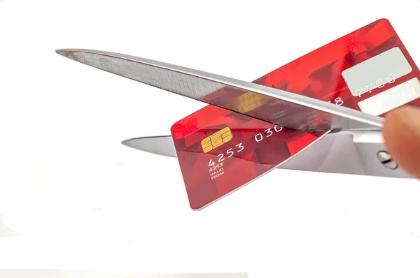 Scissors cutting old credit card — Stock Photo, Image