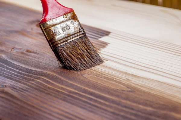 Wood texture and paintbrush — Stock Photo, Image