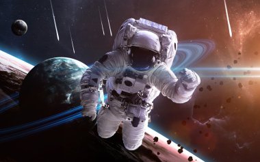 Astronot uzayda. Uzay yürüyüşü. Nasa tarafından döşenmiş bu görüntü unsurları