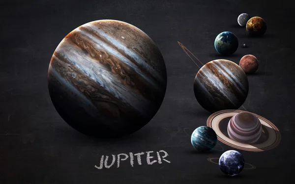 Юпитер - изображения в высоком разрешении представляют планеты Солнечной системы на доске. Элементы изображения предоставлены НАСА — стоковое фото