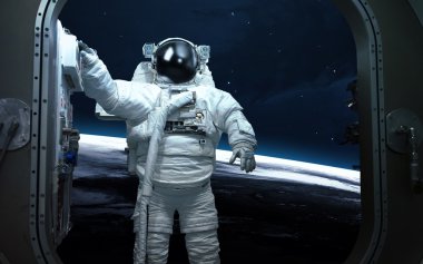 Astronot uzayda. Uzay yürüyüşü. Nasa tarafından döşenmiş bu görüntü unsurları