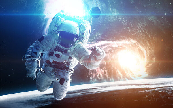 Astronaut in outer space. Elements of this image furnished by NASA
