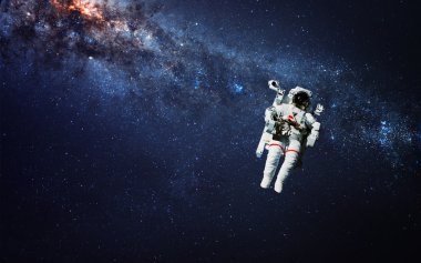 Astronot uzayda. Uzay yürüyüşü. Nasa tarafından döşenmiş bu görüntü unsurları