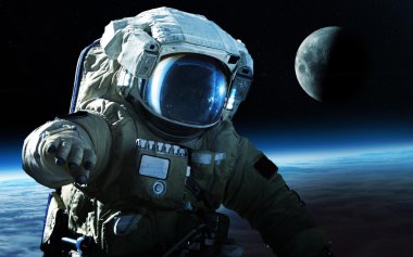 Cesur astronot, Ay'da uzay yürüyüşü. NASA tarafından döşenmiş bu görüntü öğelerini