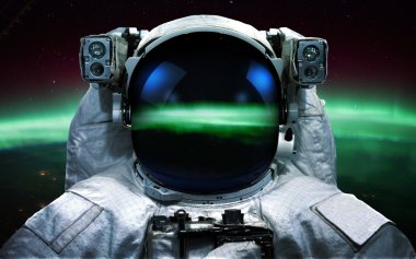 Astronot uzayda. Uzay yürüyüşü. Nasa tarafından döşenmiş bu görüntü unsurları