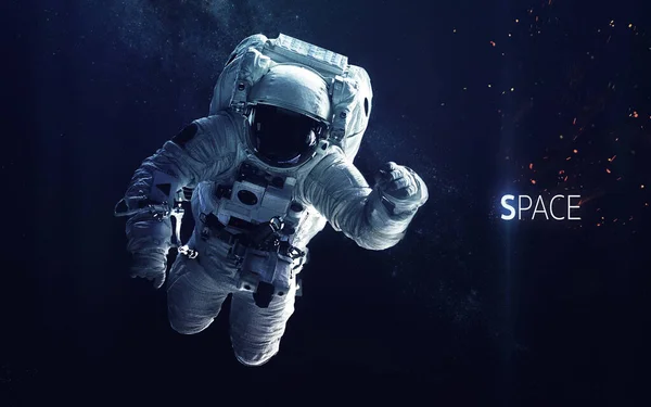 宇宙遊泳中の宇宙飛行士。宇宙芸術SF壁紙。深い空間の美しさ。宇宙には何十億もの銀河があります。NASAによって提供されたこの画像の要素 — ストック写真