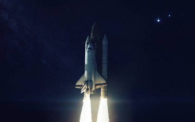 Uzay mekiği Dünya 'nın yörüngesinde dönüyor. Bu görüntünün elementleri NASA tarafından desteklenmektedir