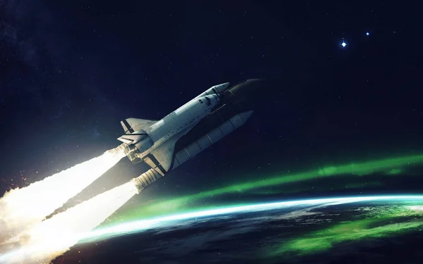 지구 궤도를 도는 우주 왕 복선. NASA 가 제공 한 이형상의 요소들 — 스톡 사진