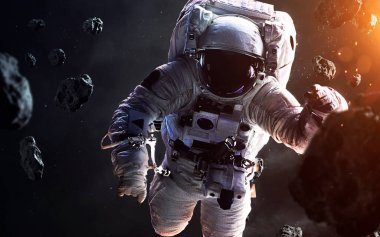 Uzay yürüyüşünde cesur bir astronot. Uzaydaki insanlar. Bu görüntünün elementleri NASA tarafından desteklenmektedir