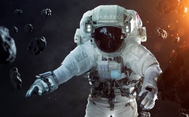 Uzay yürüyüşünde cesur bir astronot. Uzaydaki insanlar. Bu görüntünün elementleri NASA tarafından desteklenmektedir