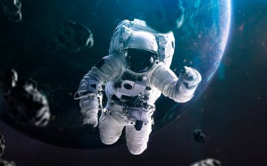 Astronot uzay yürüyüşü, muhteşem bilim kurgu duvar kağıdı, Dünya gezegeni. Bu görüntünün elementleri NASA tarafından desteklenmektedir