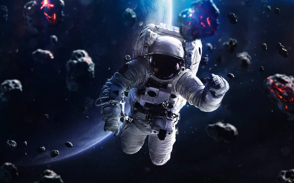 Meteorites and astronaut. Deep space image, science fiction fantasy in high resolution ideal for wallpaper and print. Elements of this image furnished by NASA — Stock Photo, Image