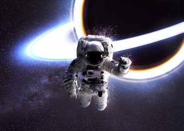 Astronot uzayda kara delik karşı. Nasa tarafından döşenmiş bu görüntü unsurları.
