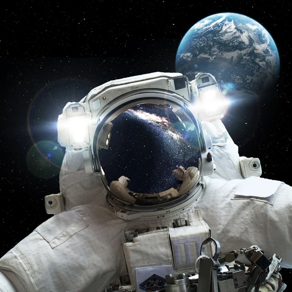 Astronaut in outer space — Stock Photo, Image