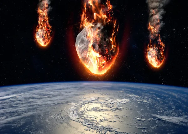 A Meteor glowing as it enters the Earths atmosphere. Elements of this image furnished by NASA — Stock Photo, Image