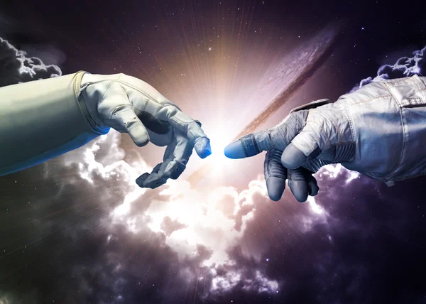Michelangelo Guds beröring. Närbild av mänskliga händer röra med fingrar i rymden. Delar av denna bild tillhandahålls av NASA — Stockfoto