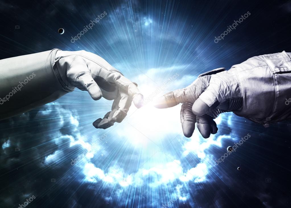 Michelangelo Gods touch. Close up of human hands touching with fingers in space. Elements of this image furnished by NASA