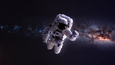 Uzayda bir astronot. Bu görüntünün elementleri NASA tarafından desteklenmektedir.