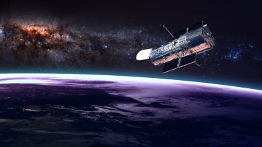 Hubble Uzay Teleskobu Dünya 'nın yörüngesinde. Bu görüntünün elementleri NASA tarafından desteklenmektedir.