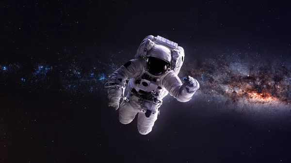 Astronauta en el espacio exterior. Elementos de esta imagen proporcionados por la NASA. —  Fotos de Stock