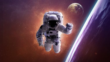 Uzayda bir astronot. Bu görüntünün elementleri NASA tarafından desteklenmektedir.