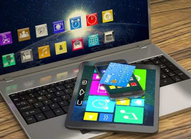Dizüstü bilgisayar, tablet, akıllı telefon ve banka kartı.