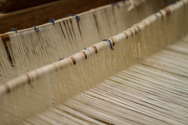 Weaving Loom and thread of yarn