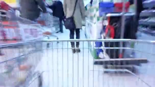 Supermarket zakupy time-lapse z kupujących — Wideo stockowe